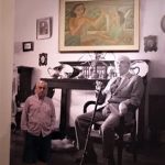 Nuestro corresponsal, ante una reproducción de la casa de Borges con un cuadro de Norah, que figura en la exposición. PROPRONews.