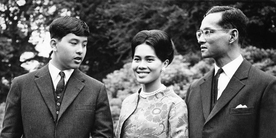 The King walks with his wife and their 13-year-old son, Crown Prince Vajiralongkorn, during a visit to Britain in 1966.