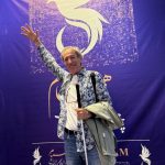 La vida de Juan Torre es un ejemplo de superación y alegría de vivir. En la imagen, en su reciente exposición en Teherán.